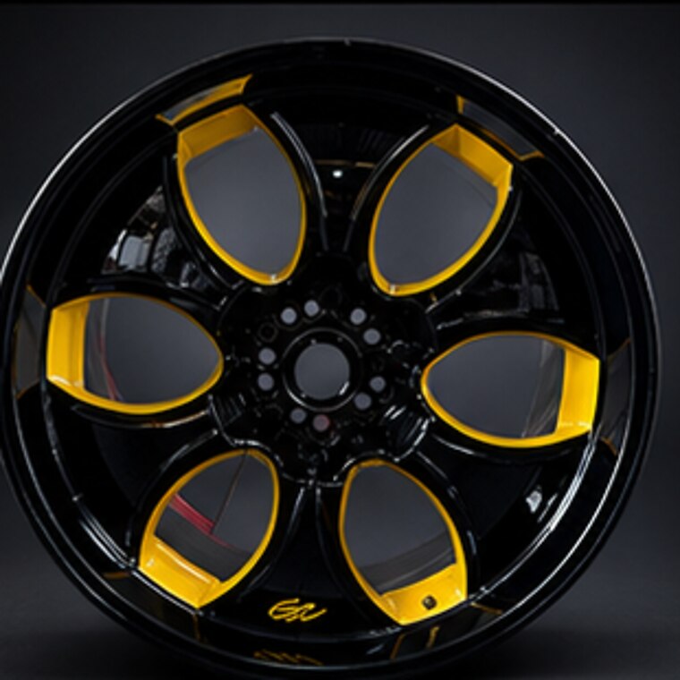 Black wheel with yellow accents